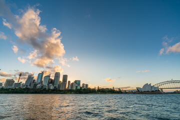 Fototapeta premium Sydney downtown skyline during sunset at Sydney harbor bay, NSW, Australia
