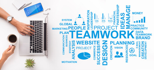 Unrecognizable employee typing on laptop at office, teamwork texting