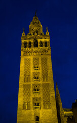 Bell Tower named Giralda in catholic Cathedral of Saint Mary in Seville, Spain