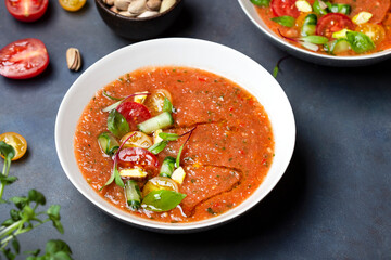 Spanish cold tomato soup gazpacho with Basil