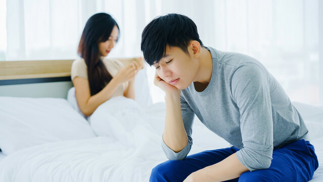 Concept Family. Asian couples have different lifestyle. Causing unhappy Quarrel causes problems in married life About sex, finance, unemployed. Social distancing
