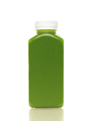 Cold-pressed spinach juice for detoxification against a white background. Juice made of organic fruits and vegetables.