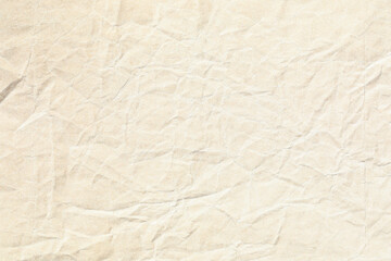 Crumpled yellow brown paper texture