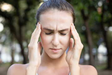 sick woman having headache, fever, pain