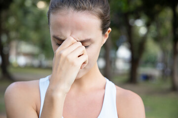 sick woman having headache, fever, pain