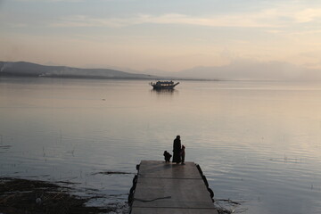 People watching the sea view on shore