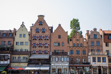 Gdansk, Poland - Juny, 2019: Motlawa river with old town architecture background in Gdansk, Poland