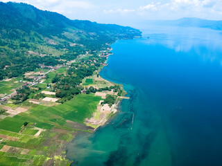 Obraz premium The beautiful aerial view of Lake Toba. Lake Toba is one of the tourist destinations in North Sumatra, Indonesia.