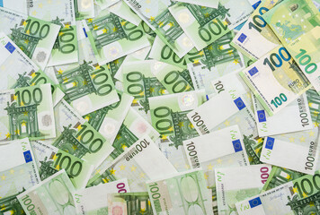 background with 100 euros. Money background. Financial concept. Savings concept. A lot of banknotes.