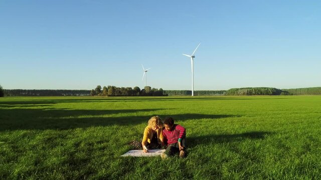 WS POV SLO MO Boy and girl (10-11) doing experiments on wind power / Breda, Noord-Brabant, Netherlands