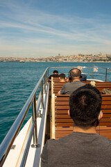 couple sitting on pier
