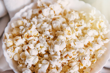 Big glass bowl of freshly popped popcorn