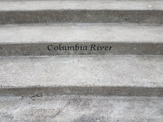 grey cement steps or stairs with Columbia River sign