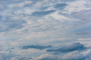Natural sky composition. Sunny vast blue sky abstract background. Beautiful cloudscape, view over white fluffy clouds. Freedom concept, on the heaven. Element of design.
