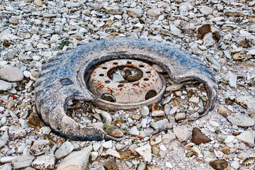 The old wheel is on the ground