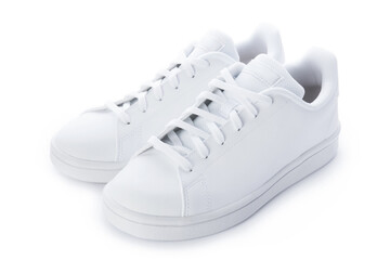 Pair of stylish sneakers isolated on white background. White casual shoes