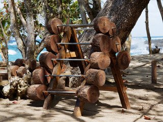  Wooden barbbells on the beach. Outdoor gym.