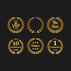 Naklejka premium Set of golden laurel wreaths on black background.