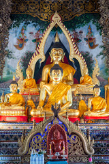 Fototapeta na wymiar the beautiful golden Buddha statue in the temple of Wat Chang Kong, Chiangmai, Thailand