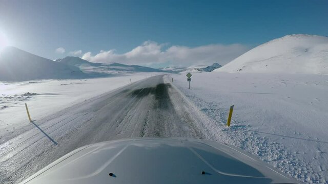 WS POV Car driving on snowy road / Iceland