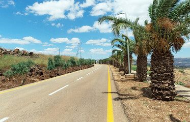 Road in the Golan Heights against the backdrop of beautiful clouds