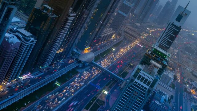 WS T/L Traffic on Sheikh Zayed Road and cityscape of Downtown Dubai / Dubai, United Arab Emirates