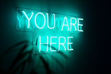 Neon sign 'you are here'