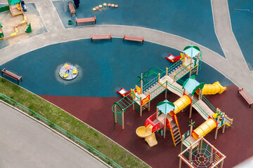 Aerial view of colorful children playground recreation area neighborhood community new residential area.