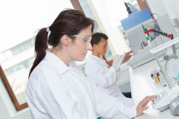 a woman technician in laboratory