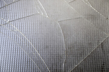 Obraz premium Broken window with bars
