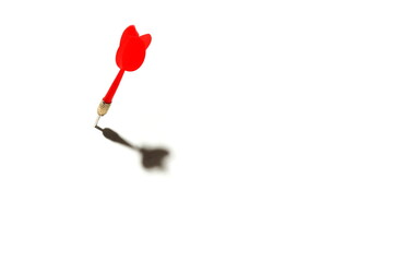 sticking red dart with shadow on white background