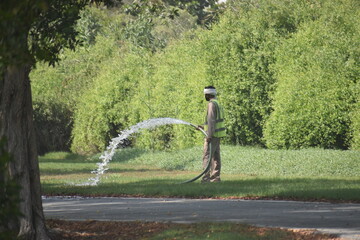 Fototapeta na wymiar .Working for gardening and irrigation job.Abu Dhabi,UAE.07.06.2020