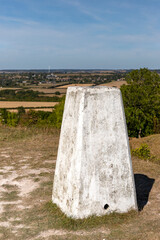 A triangulation station, or pillar, sits atop the knoll where a medieval castle once stood, with...