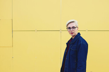 Caucasian millennial female posing on copy space background 