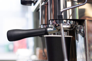 Barista Cafe Coffee Making Preparation Service Concept. prepares espresso in coffee shop; close-up. Close up of freshly ground coffee