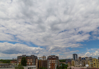 Fototapeta premium clouds over the city