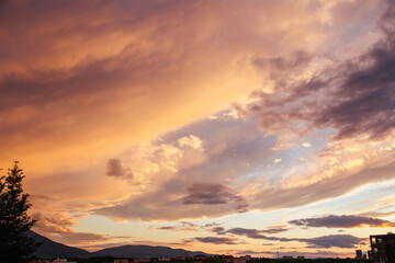 Cloudy sunset over the city of Sofia, Bulgaria. Warm colors sunset.