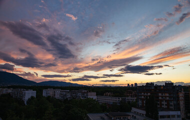 Cloudy sunset over the city of Sofia, Bulgaria. Warm colors sunset.