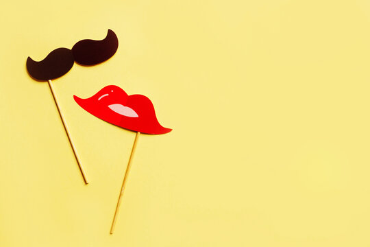 Photo booth props isolated on yellow background.