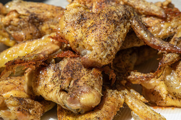 Baked chicken wings with salt and pepper.