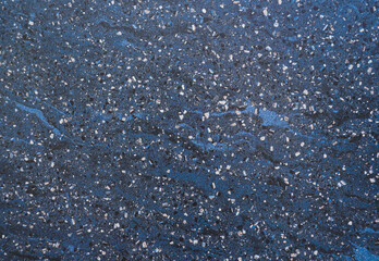 Dark Terrazzo texture. Polished concrete floor and wall pattern. Color surface marble and granite stone, material for decoration. Pattern of mosaic floor with natural stones, granite, marble, quartz. 