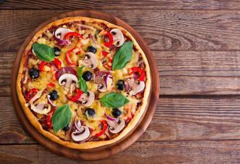 Pizza with seafood on wood table top view