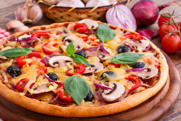 Pizza with seafood on wood table