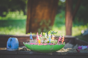 cake from sand with candle