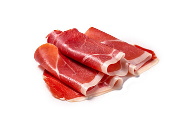 Thinly sliced jamon isolated on white background.