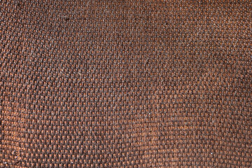 rough brown cloth texture like a canvas from an old chair upholstery - vintage background