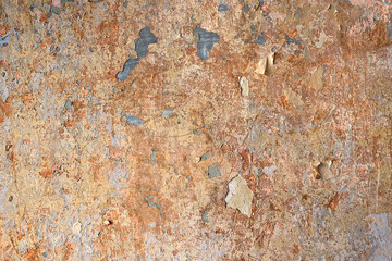 weathered and grunge wall of paper with an abstract texture and irregular orange  background color - steampunk wallpaper 