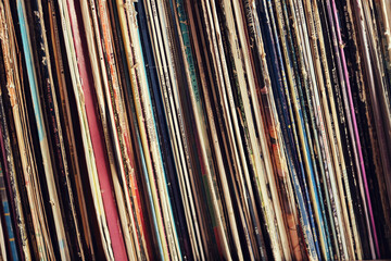 boxes of vinyl records edgewise - music collection of a vintage music lover background