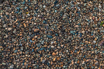 Small smooth waterworn pebbles, stones for use decor and garden landscaping.
