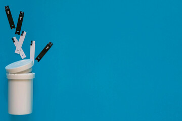 Diabetes. Monitoring blood glucose levels in diabetics. Packaging test strips for measuring blood sugar. Test Strips for glucose meter. A healthy lifestyle diabetic. Macro photo. Blue background